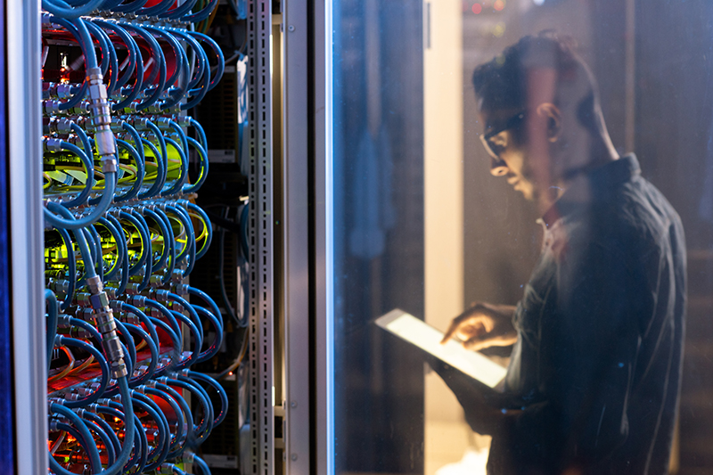 IT engineer testing new supercomputer